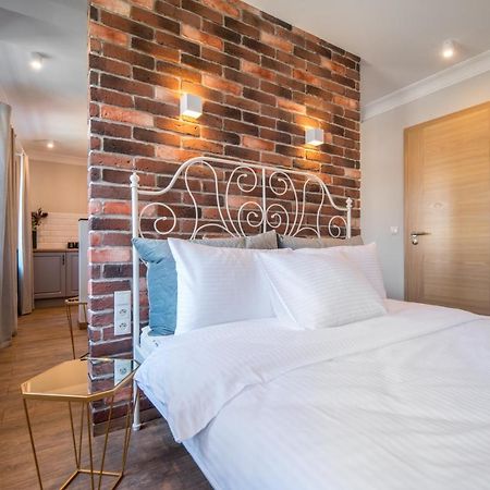 Apartamenty Rynek 27 โปรชคอฟ ภายนอก รูปภาพ